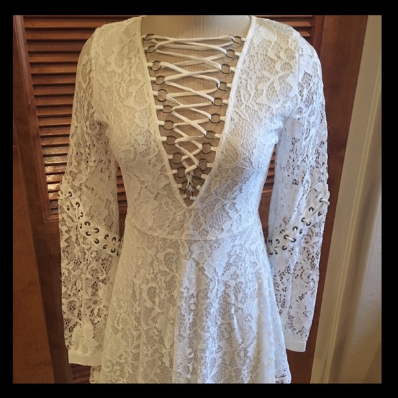 Millau Dresses & Skirts - NWT White lace dress, lace up neckline and sleeves